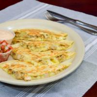 Tm Quesadillas · Flour Tortillas. Monterrey Jack Cheese and choice of protein. Served with Chipotle cream and...