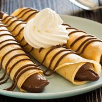 Nutella Wrap · Warmed and golden homemade tortillas filled with warm and melted Nutella.