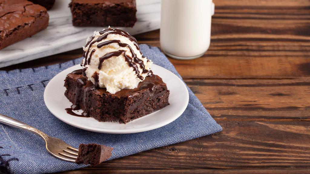 Brownie Bites In Ice Cream · Rich and creamy no churn ice cream with bite-size brownie pieces.