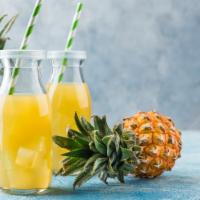Fresh Pineapple Juice · Farmers market fresh pineapples.