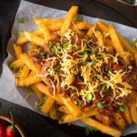 Chili Cheese Fries · Exquisite french fries mixed with melted cheese and chili, made to taste!