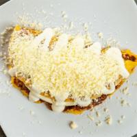Cachapa Sierra Nevada · Cachapa con queso de Mano y Topping de Nata Y Queso Rallado