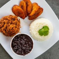 Pabellon Criollo · Shredded beef, white rice, black beans, sweet plantain