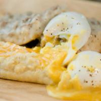 Biscuits And Gravy · Choice of fried or poached eggs with grits or homefries