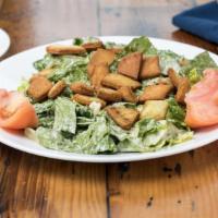 Caesar Salad · Served with pita bread.