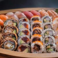 Boat For Two · 14 pieces sashimi, 8 pieces of sushi, California Roll, spicy Tuna & 1/2 Salmon roll