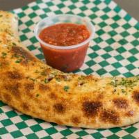 Stromboli · Pepperoni, sausage and cheese filled pizza roll.