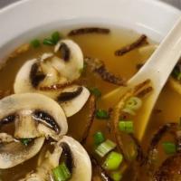 Taki Soup · Savory broth, fried onions and mushrooms.