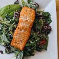 Summer Seared Salmon Salad · Seared salmon with cucumber, Kalamata olives, avocado, onions, tomato, and baby arugula in c...