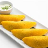 Colombian Empanadas · Authentic Colombian patties filled with beef and potatoes (4pieces).