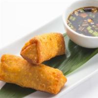 Egg Rolls (2 Pc) · Hand rolled marinated with pork and vegetables, served with citrus ponzu sauce.