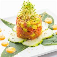 Salmon Tartare · Chopped salmon with sesame oil, avocado, spicy mayo and sesame seeds