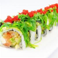 Nikki Beach Roll · NIKKI BEACH ROLL
Shrimp tempura, salmon, avocado inside, asparagus tempura, cream cheese top...