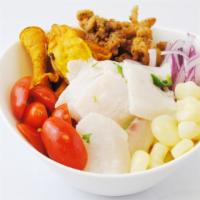 *Ceviche Poke · White fish marinated with citrus sauce, crispy calamari, Peruvian corn, cilantro, red onions...