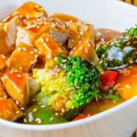 Chicken Teriyaki Bowl · Grilled Chicken Breast served with teriyaki sauce, sesame seeds, steamed veggies and the opt...