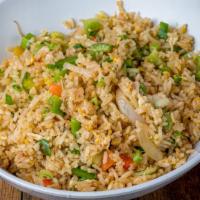 Veggies Fried Rice  · Made with sesame oil ,Scallions,Onions,Bean Sprouts and Eggs with our Special Sauce , red pe...