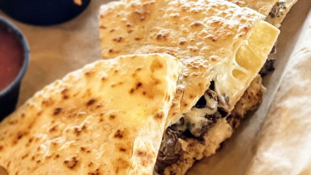 Traditional · Grilled flour tortilla stuffed with our Mexican three cheese blend.