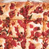 Grandma’S Pizza · 16” Sicilian style pizza, just like grandma used to make. Serves 16 square slices of pizza. ...
