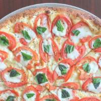 Margherita (Personal) · This is a sauceless pizza with fresh sliced roma tomato, fresh milk mozzarella, and  fresh b...