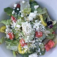 Greek Salad · Romaine, Roma tomatoes, red onions, cucumbers, kalamata olives artichoke hearts, banana pepp...
