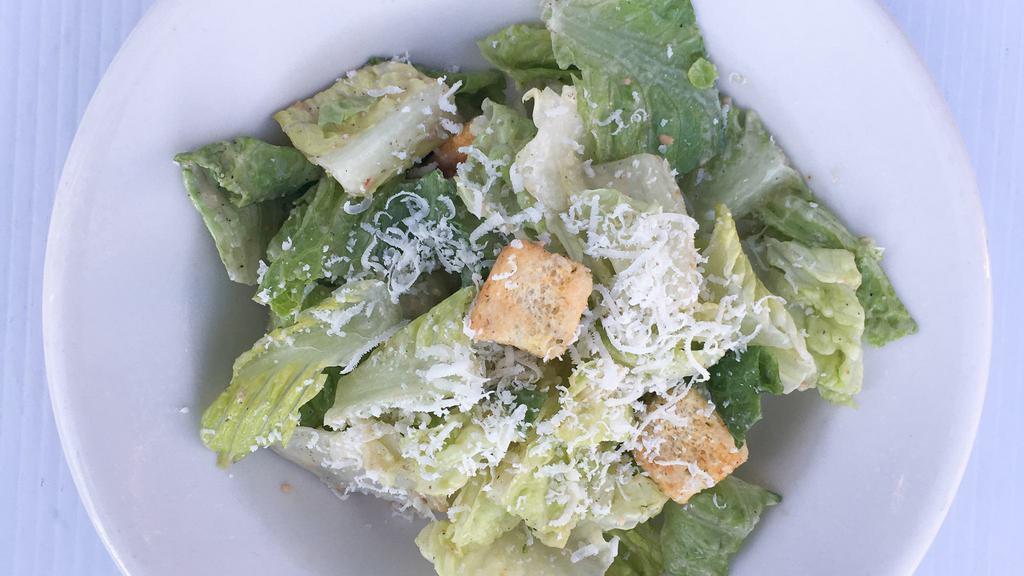 Caesar Salad · Romaine, croutons, freshly shredded Parmesan, caesar dressing.