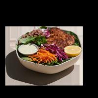 Blackened Catfish Bowl · blackened catfish, shredded cabbage, raw carrots, red onion, basil, sunflower seeds, warm wi...