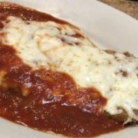 Chicken Parmigiana · Breaded cutlet topped with mozzarella cheese and tomato sauce. All entrees are served with p...