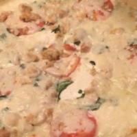 The Great White Pizza By Dan · White pizza with ricotta and mozzarella cheese, chicken, fresh tomato, and spinach.