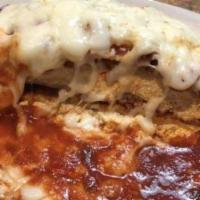 Lasagna · Layered pasta with homemade meat sauce, ricotta cheese, covered with melted mozzarella chees...