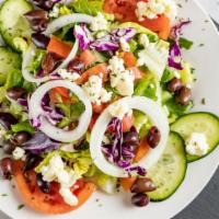 Greek Salad · Fresh lettuce, tomatoes, cucumbers, onions, feta cheese, and kalamata olives served with dre...