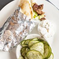   Greek Gyro · Gyro meat, lettuce, tomato, onion, cucumber, tzatziki sauce on a grilled pita