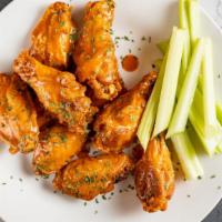 Boneless Wings · A generous portion of boneless wings, tossed in your choice of sauce and served with blue ch...