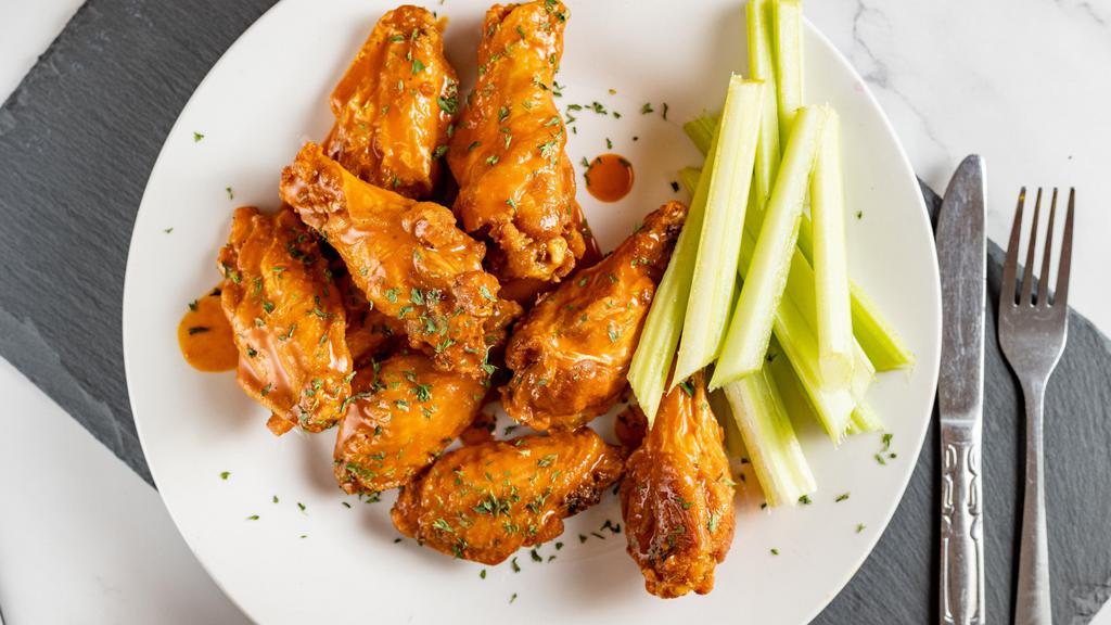 Boneless Wings · A generous portion of boneless wings, tossed in your choice of sauce and served with blue cheese and celery.