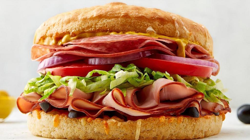 The Original · Where it all started. ham | salami | 3 cheeses | olives | lettuce | onion | tomato | mustard | signature sauce | sourdough bun.