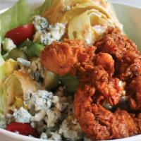 Huge Hot Chicken Wedge · Nashville hot chicken tenders, ‘Bama white sauce, chopped pickle, celery, blue cheese, olive...