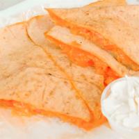 Quesadilla · Guest Favorite. Melted cheese blend with tomatoes, green peppers, and onions in a tortilla. ...