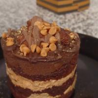 Peanut Butter Lovers Cake · chocolate brownie, chocolate cake, peanut butter mousse, peanut butter chips