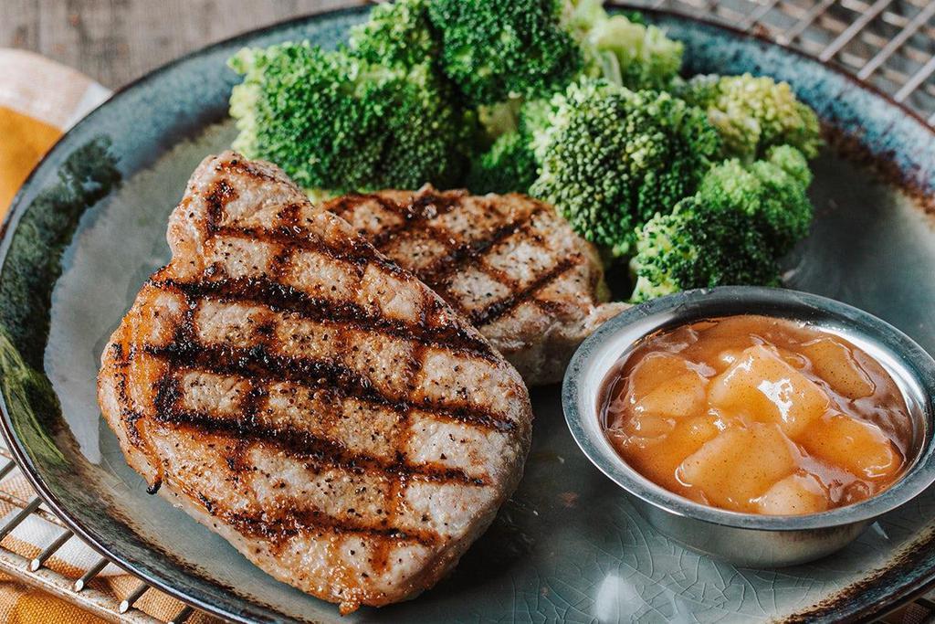 Mesquite-Grilled Pork Chops · Two 6 oz. juicy, mesquite-grilled pork chops.