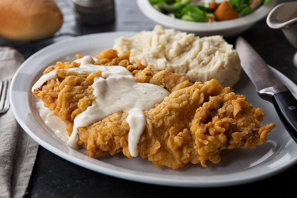 Country Fried Steak · Topped with white pepper gravy.