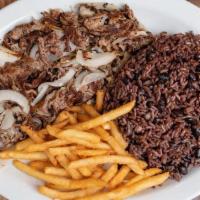Vaca Frita · *(Polo Norte's Specialty Item) Grilled shredded beef with onions.