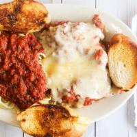 Chicken Parmigiana · Boneless chicken breast lightly breaded and deep fried. Topped with our special Italian sauc...