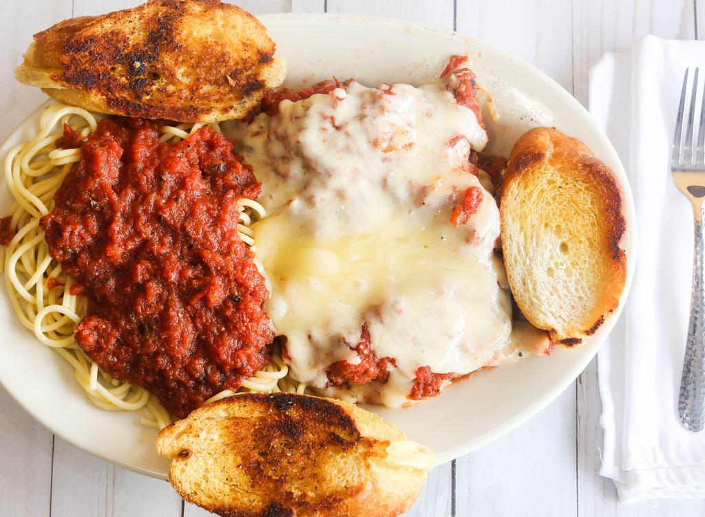 Chicken Parmigiana · Boneless chicken breast lightly breaded and deep fried. Topped with our special Italian sauce and mozzarella cheese. Served with pasta.