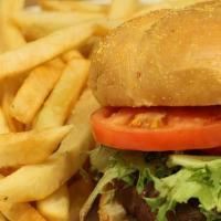 Beef Hamburger · Half a pound of Angus ground chuck char-grilled, served on a bun with lettuce & tomato.