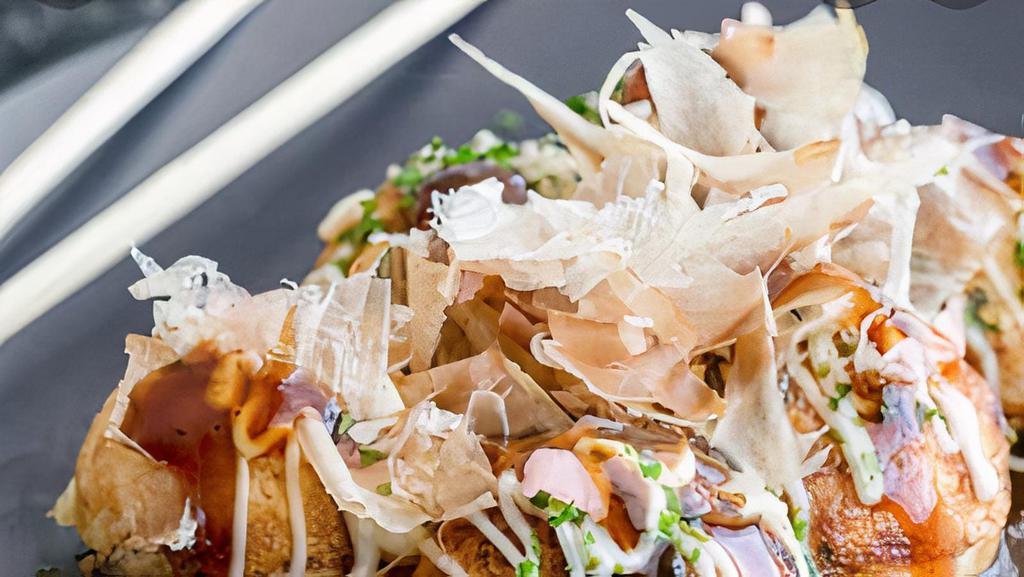 Takoyaki · Deep fried battered squid ball with Japanese mayo and bonito.