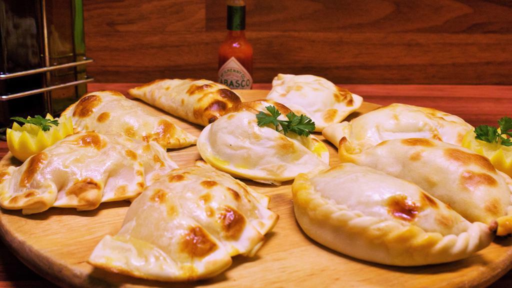 Empanadas · Oven baked, with your choice of ham and cheese chicken or meat. Each.
