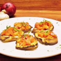 Bruschetta · Recommended. Vegetarian food. Toasted bread topped with our homemade chopped tomato dressing...