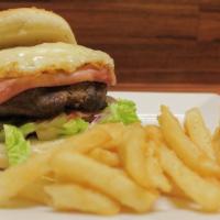 Il Ponte Burger · Recommended. Half pound sirloin burger with ham, fried egg, mozzarella cheese, lettuce, toma...