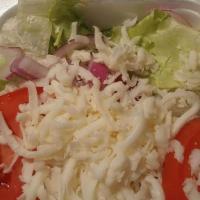 House Salad · Lettuce, tomatoes, onions, and mozzarella cheese.
