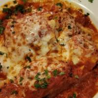 Baked Ziti · Penne pasta with mozzarella ricotta and parmesan cheese. served with fresh-cut salad and gar...