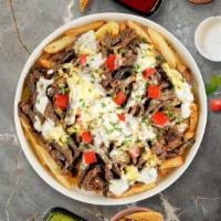Proud Philly Loaded Fries · Steak, caramelized onions, bell peppers, and melted cheese topped on Idaho potato fries.